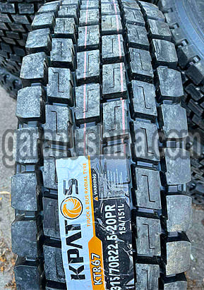 Kpatos KTR67 (приводная) 315/70 R22.5 154/151L 20PR - Фото протекора с этикеткой вблизи